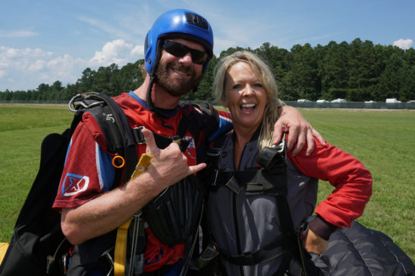 Tandem Instructor, Dave Fulk gives a "thumbs up" after a skydive.