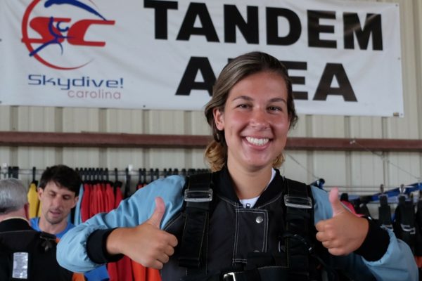 tandem student inside Skydive Carolina hangar